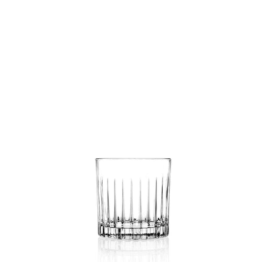 Clear glass tumbler on a white background